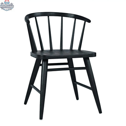 Black Fitz Dining Chair by Hygge Design House with sleek modern design and wooden legs.
