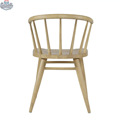 Hygge Design House Fitz dining chair with wooden legs and upholstered backrest, modern and stylish for contemporary dining rooms.