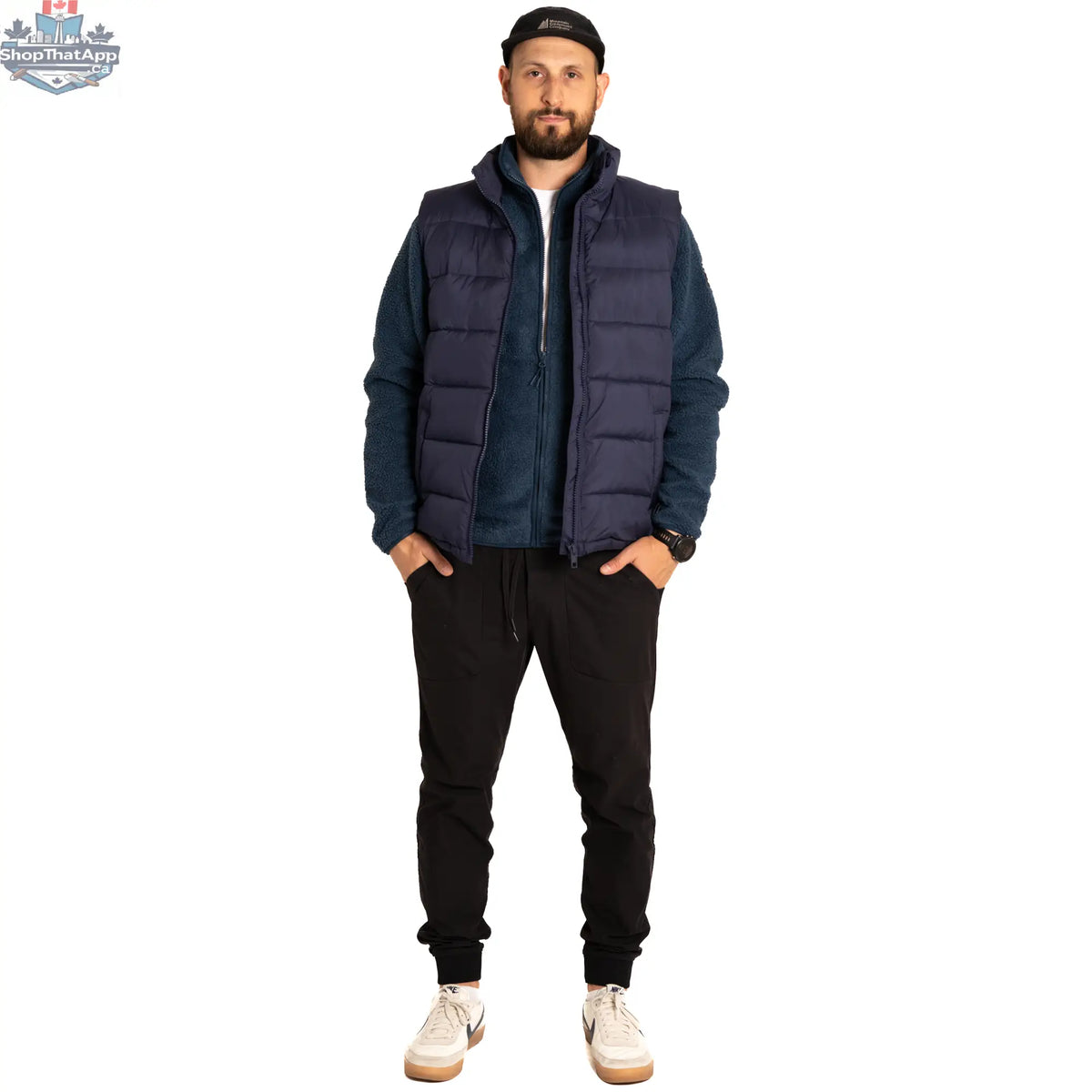 Northern Sun Revelstoke Recycled Men’s Vest with front pockets and eco-friendly fabric, suitable for outdoor layering.
