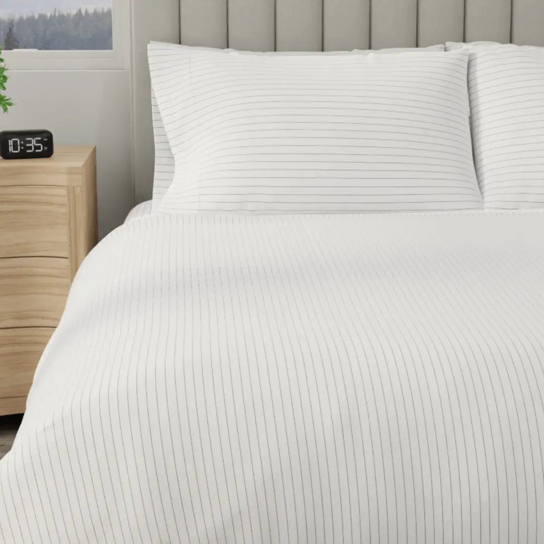 Organic percale duvet cover by Skylark+Owl Canada featuring a soft, crisp fabric with a stylish, modern design.