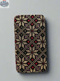 Handheld large Palestinian wallet by The Olive Tree in red, gold, watermelon, or kufiya pattern with traditional design.