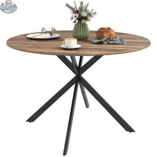 Amory 47-inch round industrial dining table with dark brown top and black steel legs, ideal for modern kitchen or dining room.