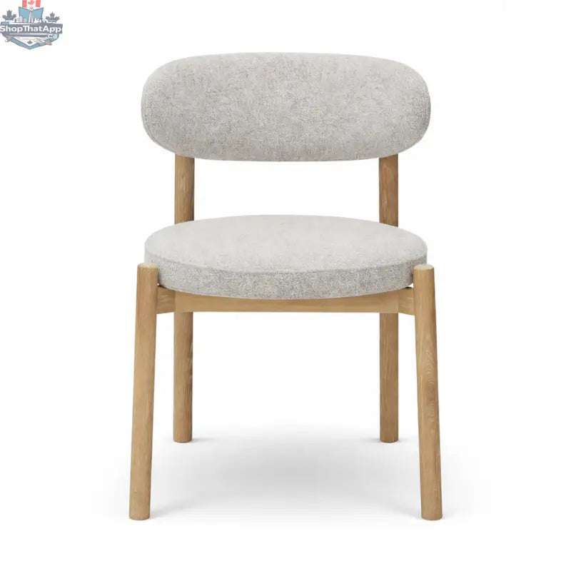 Hygge Design House Orazio dining chair with wooden legs and upholstered seat, modern and stylish for dining rooms