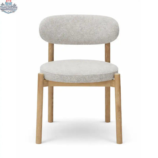 Hygge Design House Orazio dining chair with wooden legs and upholstered seat, modern and stylish for dining rooms