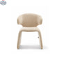 Oriana Sculpted Dining Chair by Hygge Design House, featuring a stylish modern design with curved backrest and wooden legs.