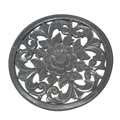 Wooden carved flower accent in round decorative home decor piece by Suzie Blue Canada, features intricate floral design.