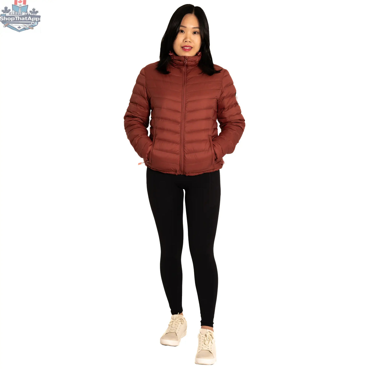 Northern Sun packable down jacket displayed on a hanger, featuring lightweight, insulated design suitable for outdoor wear.