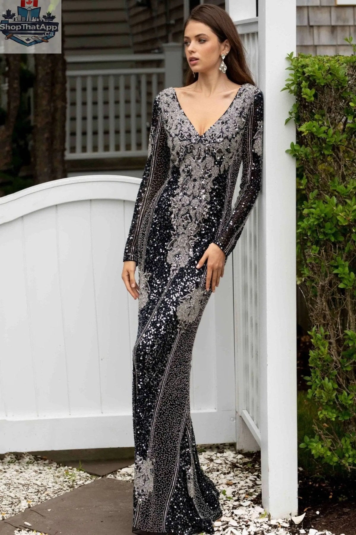Beaded black and silver long sleeve top with allover design by Elegant Threads, showcasing intricate beadwork and stylish elegance.