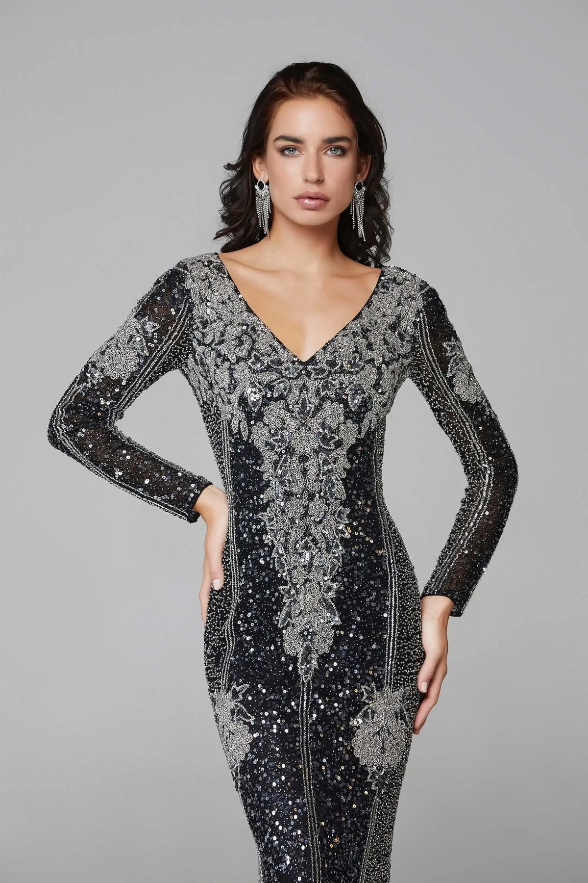 Beaded long sleeve top by Elegant Threads with allover silver and black bead design, stylish and elegant for fashionable wear.