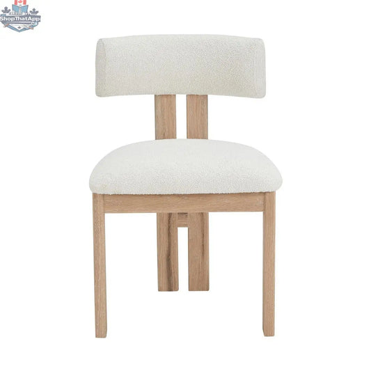 Swal Ash Wood Dining Chair by Hygge Design House featuring a solid wood seat and sleek, modern design for dining room decor.
