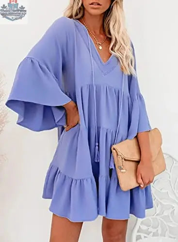 Black AILUNSNIKA women’s long sleeve mini dress with V-neck, flowy fit, and solid color for elegant, effortless style.