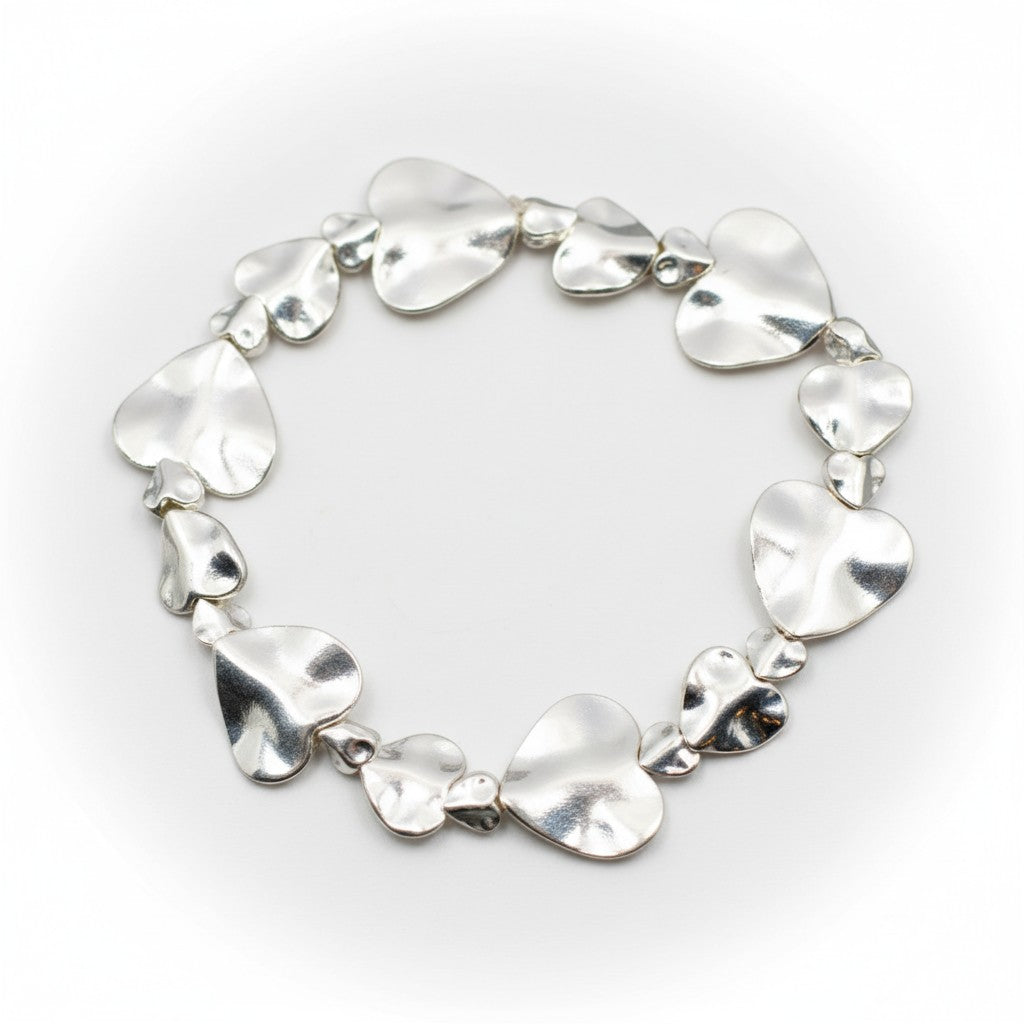 Beaten Heart Bracelet in Silver Plate - Shopthatapp.ca