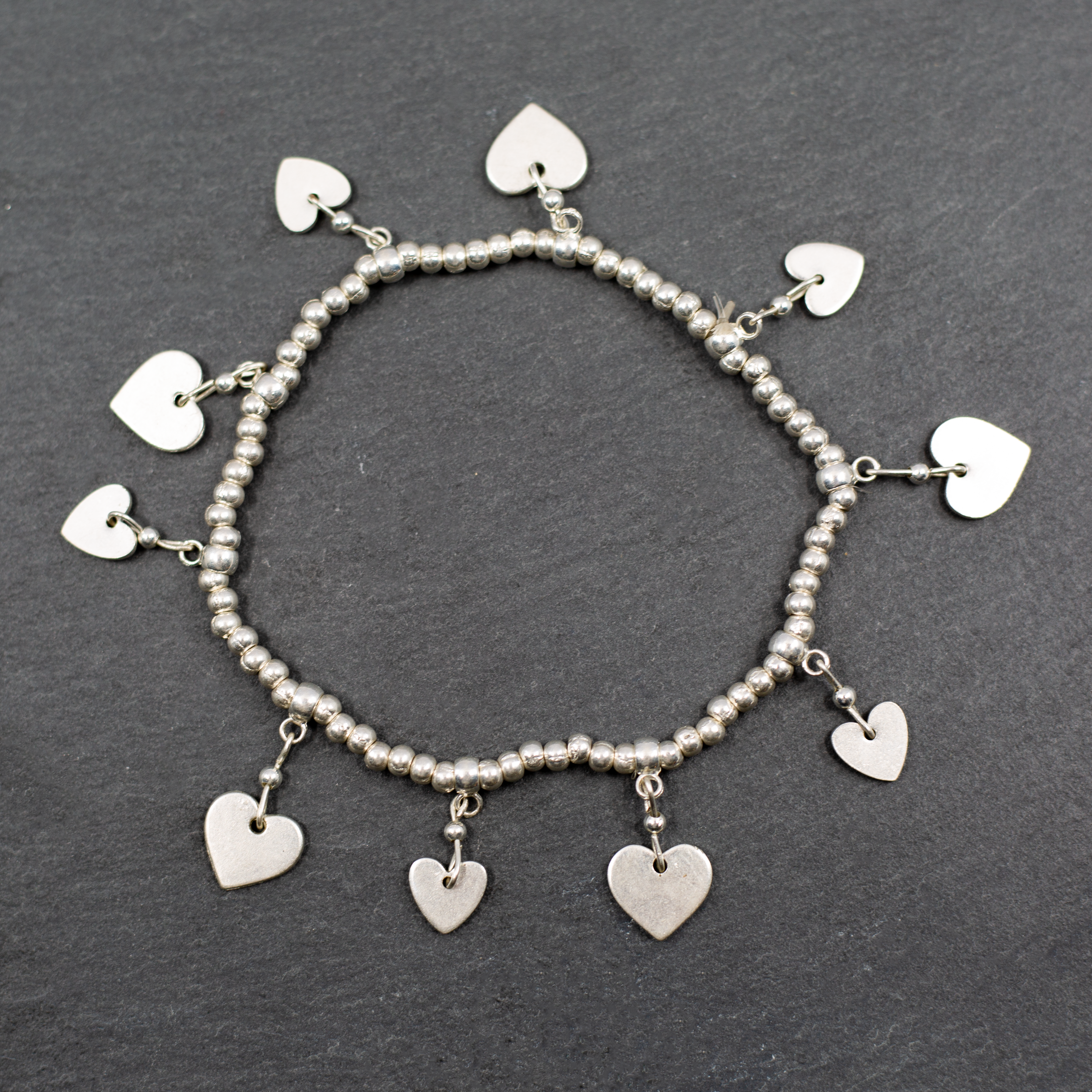 Silver Heart Charm Bracelet with Elasticated Design - Shopthatapp.ca
