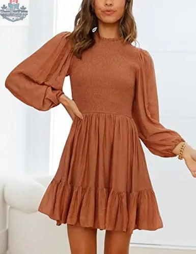 ADEWEL women's ruffle mini dress with long sleeves and mock neck, featuring stylish ruffle details and a fitted silhouette.