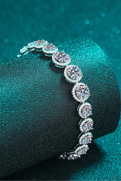 Sterling silver moissanite bracelet with 10.4 carats of sparkling gemstones, elegant jewelry piece featuring intricate design.