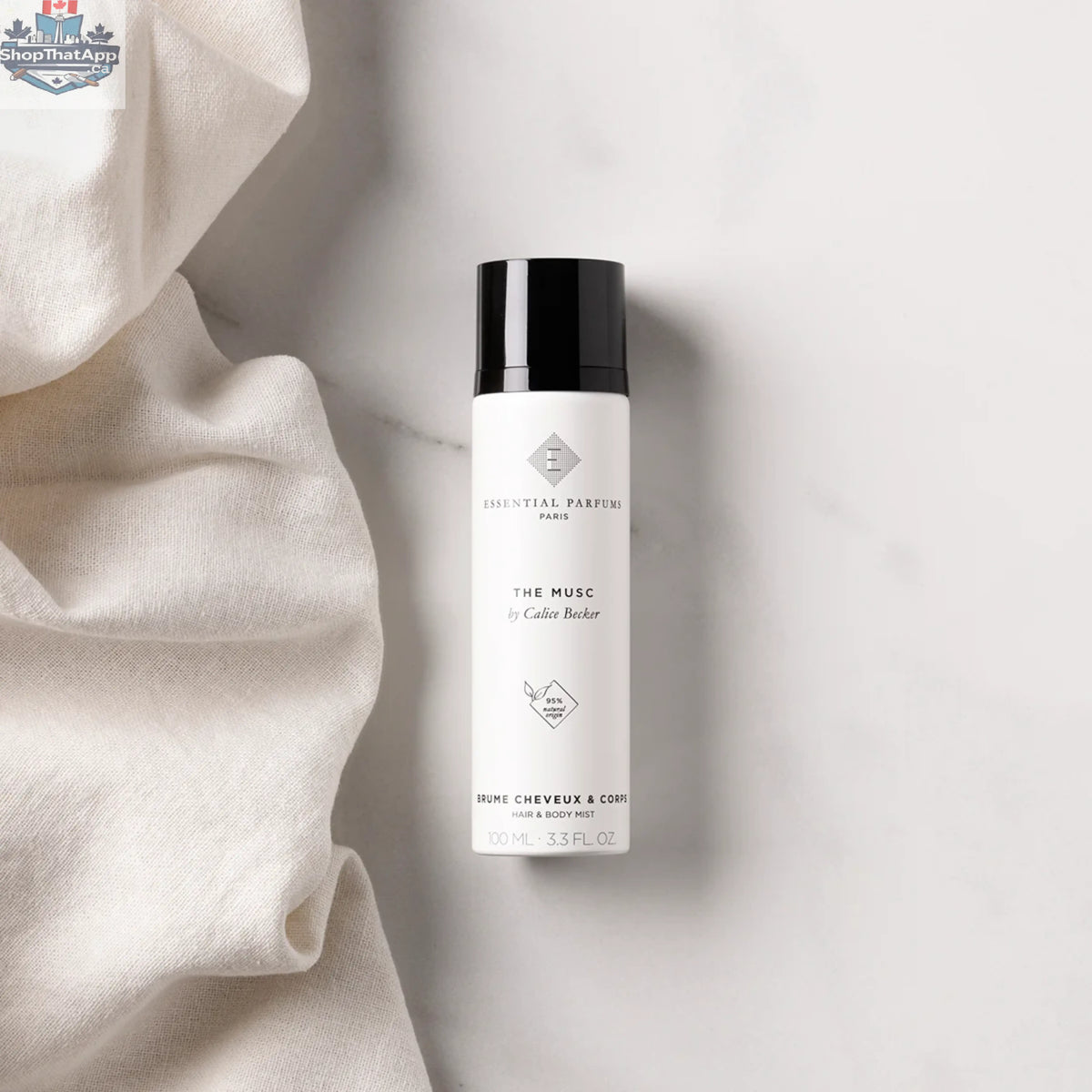 Lightly fragranced Essential Parfums The Musc Hair & Body Mist in 100 ml bottle, featuring a soft, musky scent for hair and body.