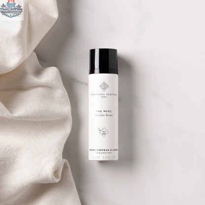Lightly fragranced Essential Parfums The Musc Hair & Body Mist in 100 ml bottle, featuring a soft, musky scent for hair and body.