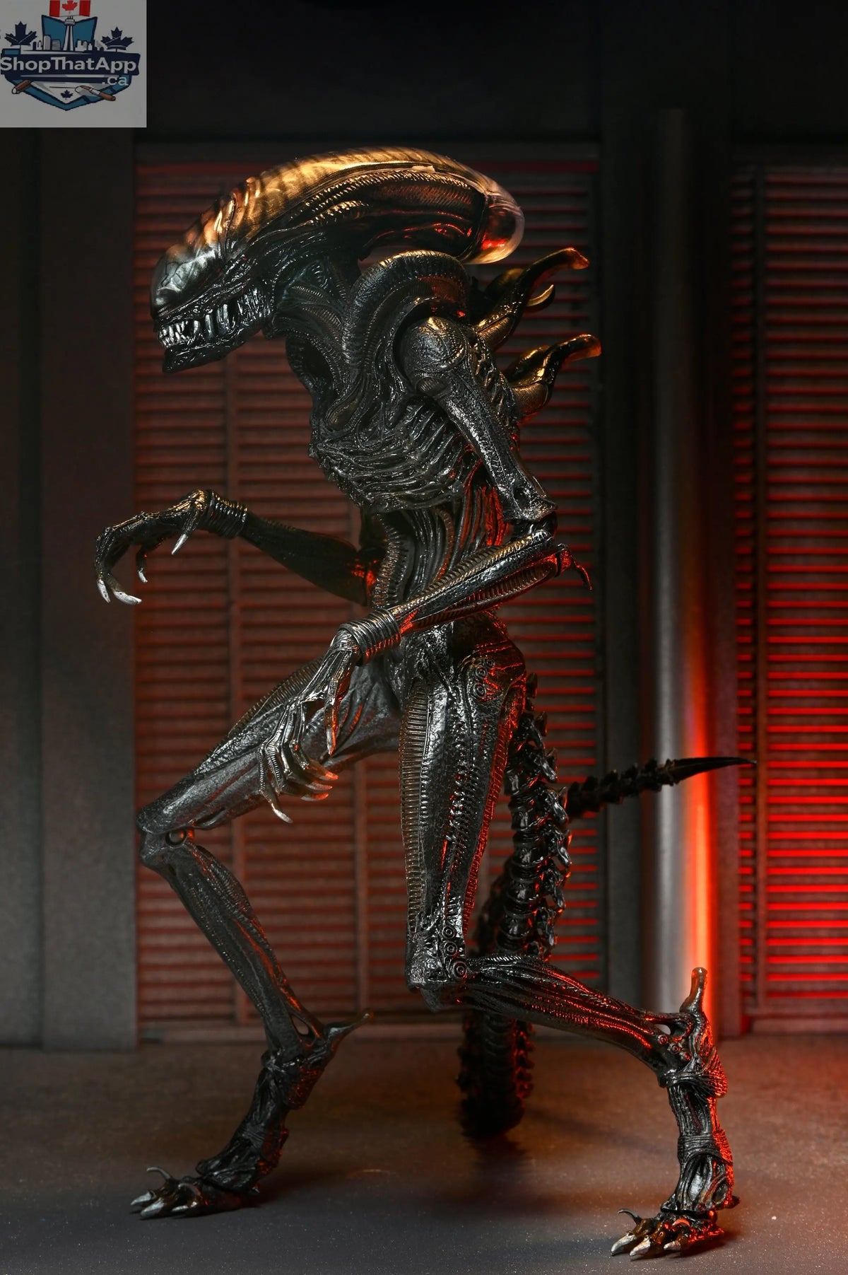Toy Snowman Alien Romulus Scorched Xenomorph 7-inch collector's action figure from the Ultimate Edition series.