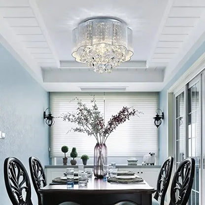 Elegant crystal ceiling light fixture with hanging crystal accents, designed for stylish interior lighting.