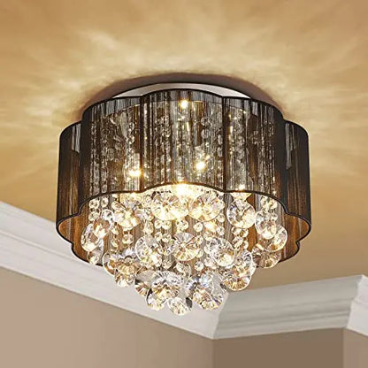 Elegant crystal ceiling light fixture with sparkling glass accents, designed for modern interior lighting.