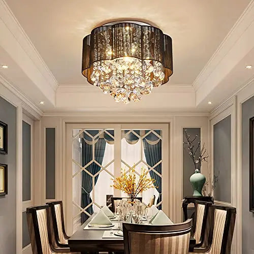 Elegant crystal ceiling light fixture by AGV LIGHTING featuring hanging crystal prisms and a sleek modern design.