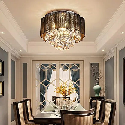 Elegant crystal ceiling light fixture by AGV LIGHTING featuring hanging crystal prisms and a sleek modern design.
