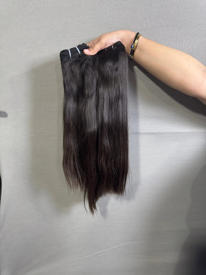 Three bundles of Prithvi Mart Indian Raw Straight Hair extensions displayed, showcasing premium quality straight hair for styling.