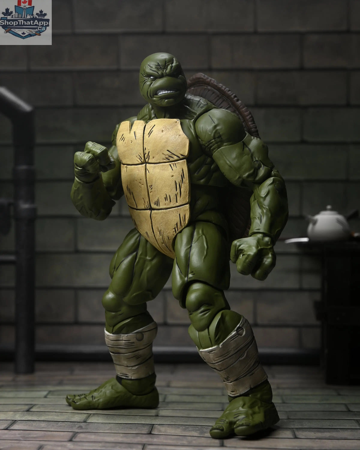 Battle damaged Teenage Mutant Ninja Turtles Last Ronin action figure by Toy Snowman, featuring detailed armor and weapon accessories.