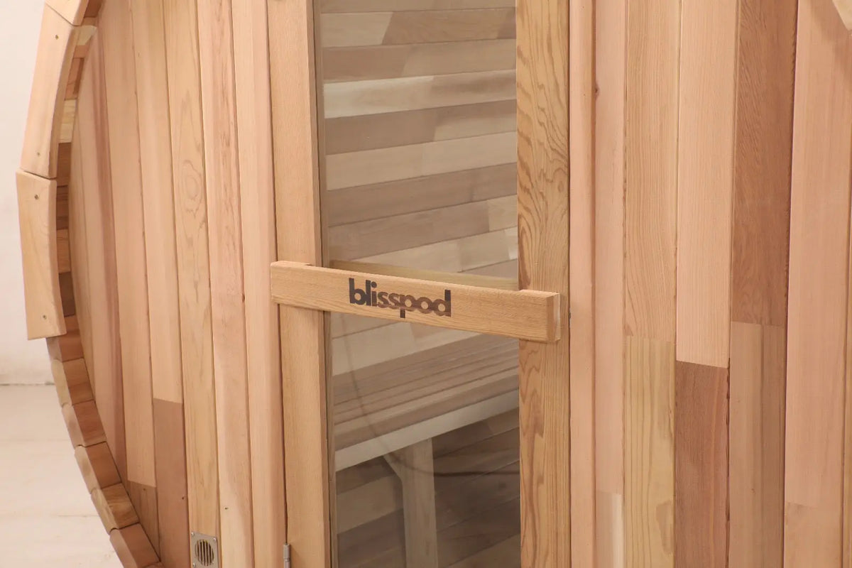 Zoppinh Blisspod Prague outdoor sauna with red cedar exterior, full glass back, designed for 4-6 persons, dimensions 70.87 inches.