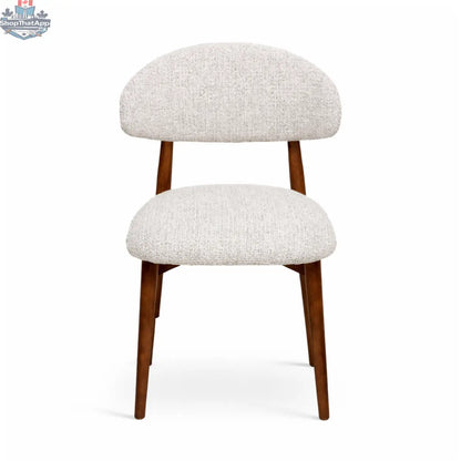 Hygge Design House Cammy Dining Chair with wooden legs and upholstered seat, modern and stylish for dining room décor.