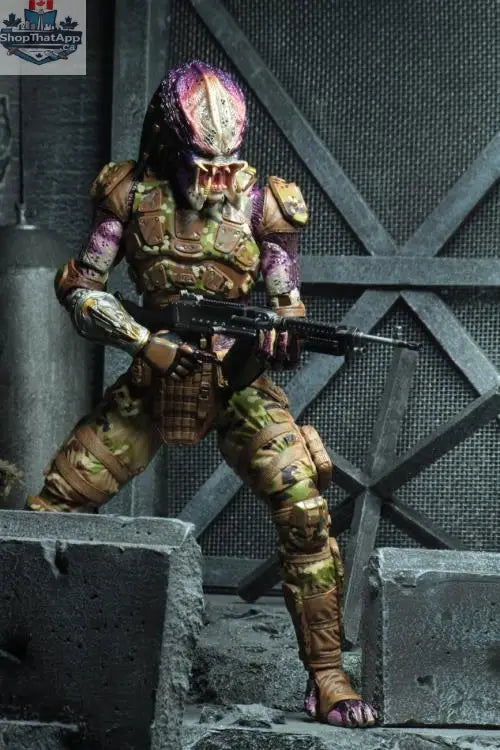Toy Snowman Predator Ultimate Emissary action figure from The Predator collection, detailed figure in dynamic pose with intricate armor.
