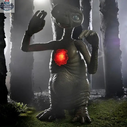 NECA E.T. 40th Anniversary deluxe action figure with LED light-up chest, detailed collectible toy from Toy Snowman.