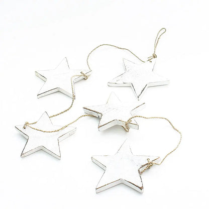 String of five hanging wooden star decor pieces from Suzie Blue Canada, ideal for home decoration and wall display.