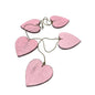 Set of five hanging wooden heart garlands by Suzie Blue Canada, decorative wooden hearts for home decor.