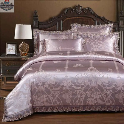 Luxury Jacquard Cotton Bedding Set by SLOTH Nation with four-piece duvet cover and silk-satin finish bed sheet on a bed.