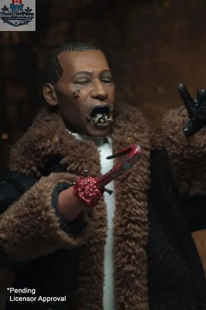 Toy Snowman NECA Candyman action figure, detailed collectible toy from the horror movie character, featuring intricate design and vibrant colors.