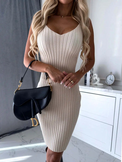 Women's long-sleeved skirt set by Like2b-uy, featuring a solid stripe top and tight suspender skirt for a stylish autumn winter look.