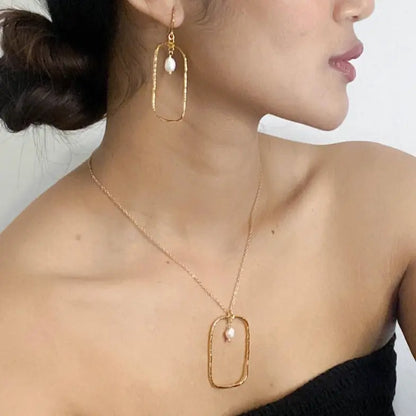 Hammered gold rectangle earrings with pearls, gold plated Suzie Blue Canada jewelry, showcasing elegant and modern design.