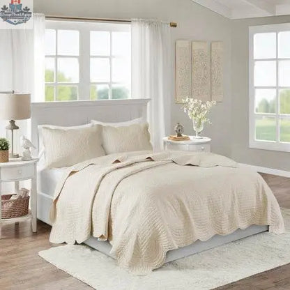 Reversible scalloped edge quilt set comforter by EX-STOCK Canada, featuring floral and geometric patterns in soft colors.