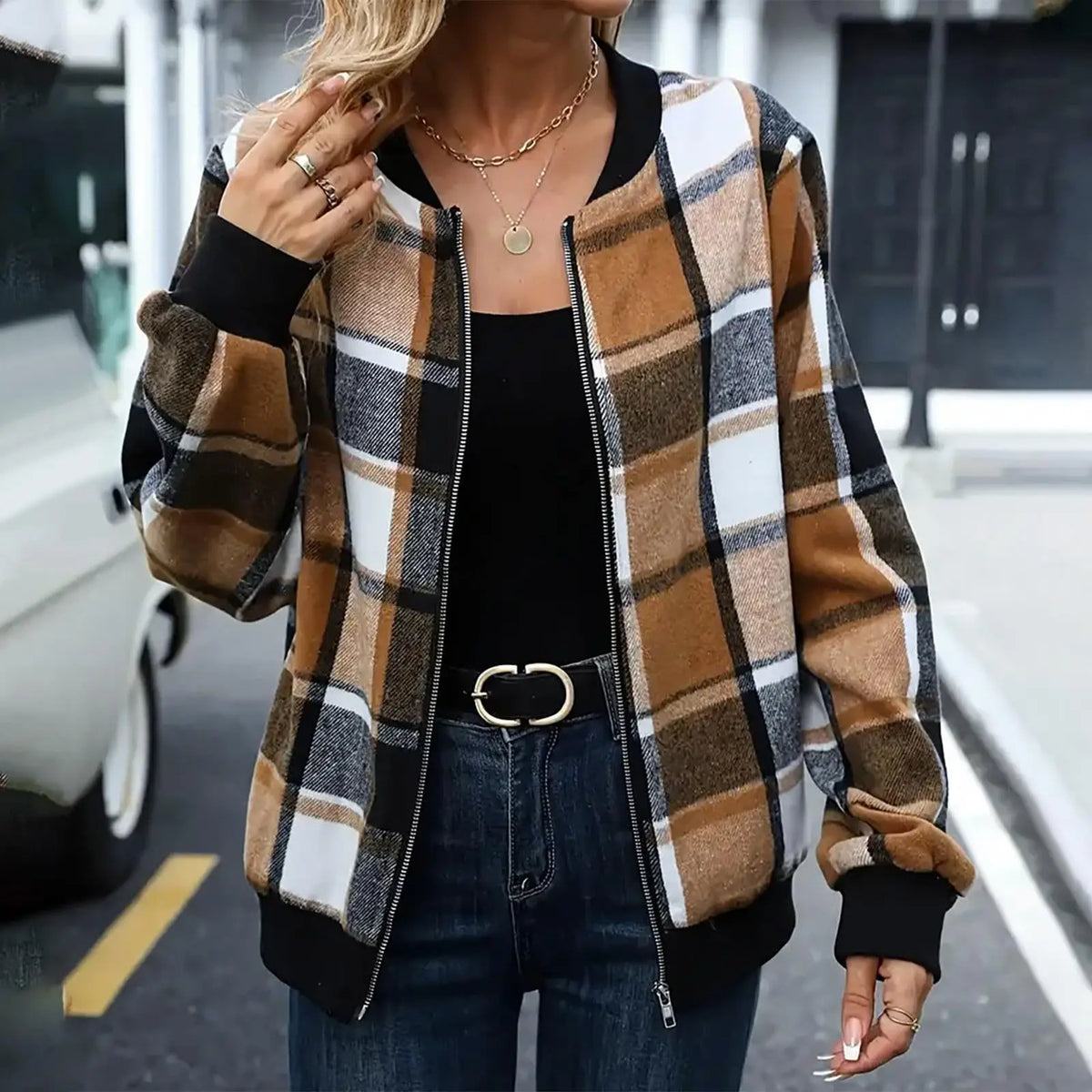 Female CITADL bomber jacket with a stylish design, featuring a zip-up front and fitted silhouette.