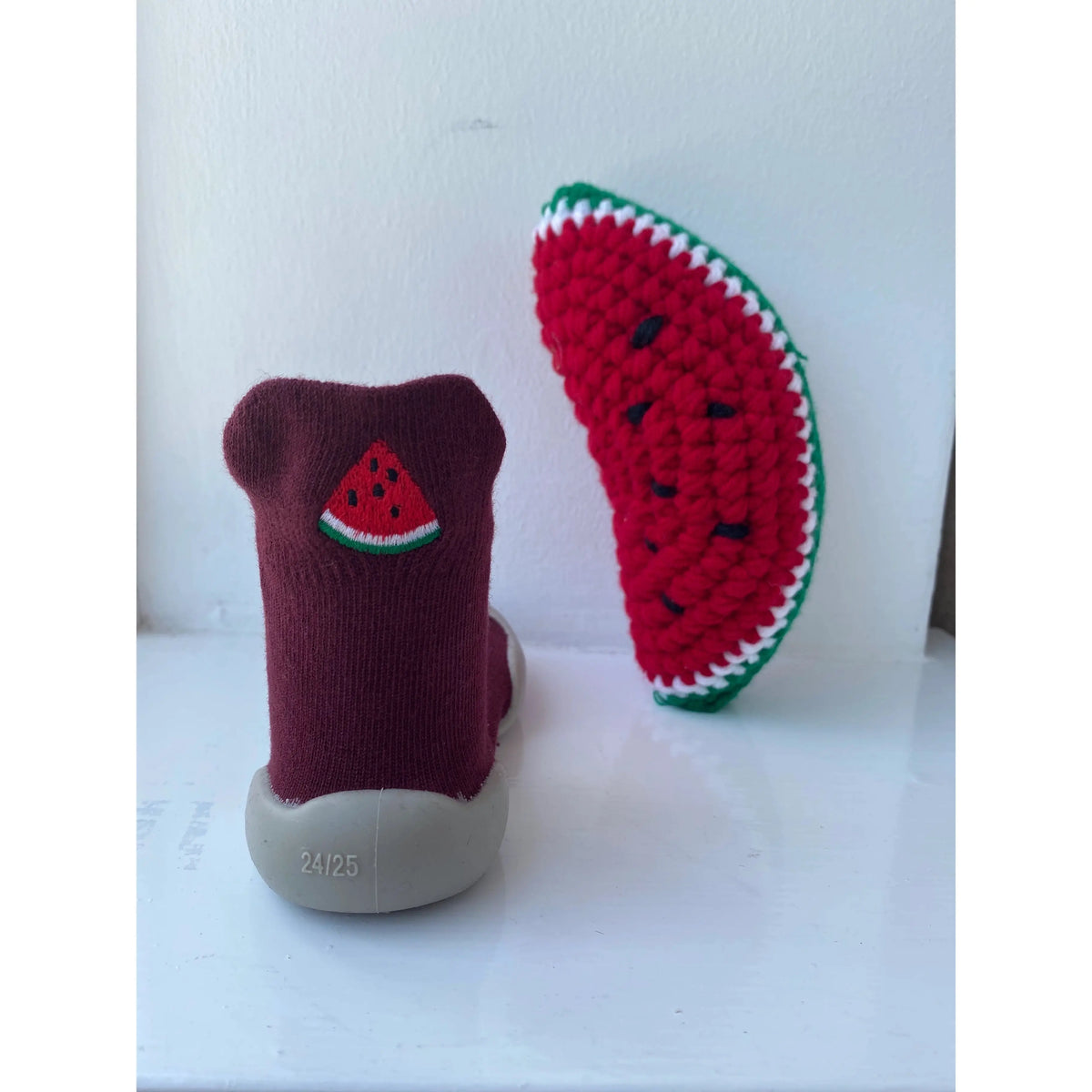 Wild Baby sock shoes in soft fabric with colorful patterns, designed for comfortable and stylish baby footwear.