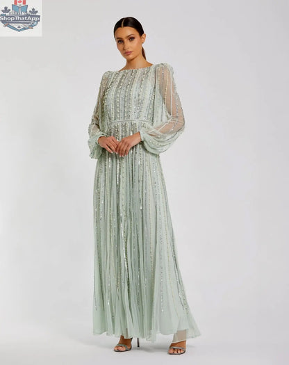 Elegant Threads mint boat neck long sleeve evening gown with striped beading, showcasing a fitted silhouette and intricate detailing.