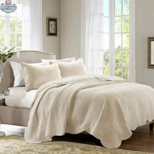 Reversible scalloped edge quilt set comforter by EX-STOCK Canada with floral and geometric patterns in soft, cozy bedding fabric.