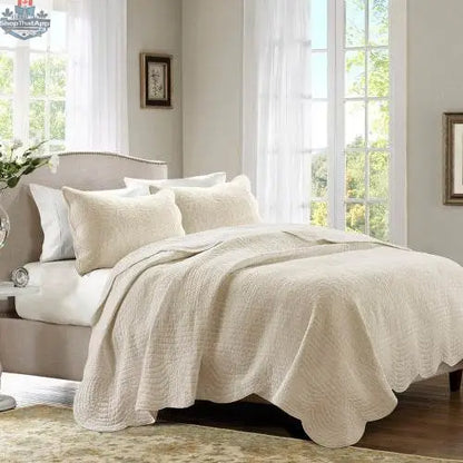 Reversible scalloped edge quilt set comforter by EX-STOCK Canada with floral and geometric patterns in soft, cozy bedding fabric.