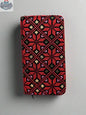 Handheld large Palestinian wallet by The Olive Tree in red, gold, watermelon, or kufiya pattern, featuring traditional Palestinian textile design.