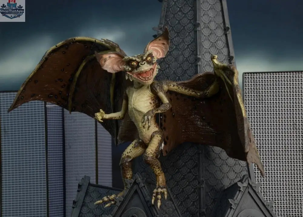 Toy Snowman Gremlins 2 Bat Gremlin action figure, detailed collectible toy from the Gremlins 2 movie series with wings and menacing look.