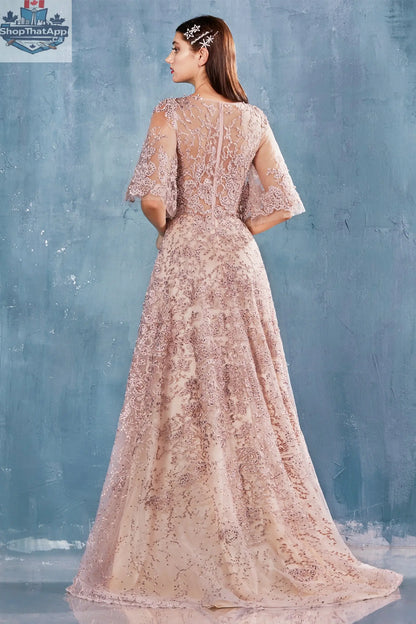 Elegant Threads Doris evening gown displayed on a hanger, featuring a flowing fabric and intricate design details.