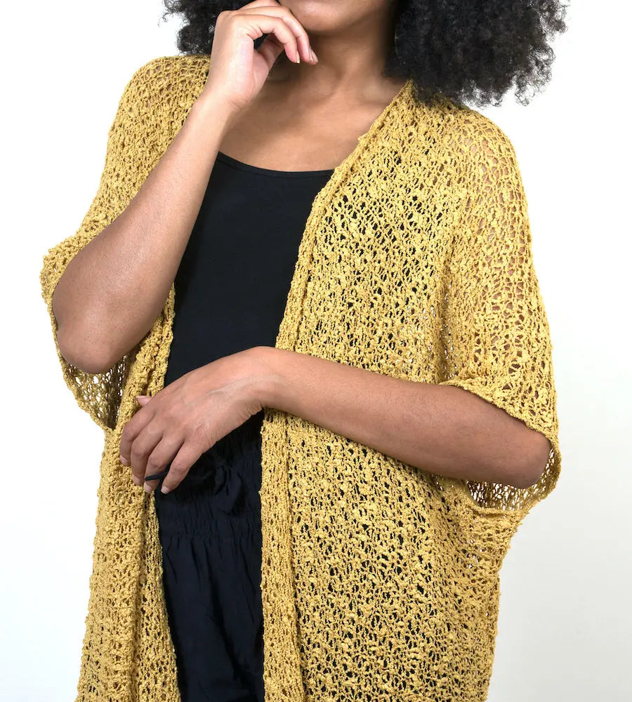 Mid-length mustard popcorn knit kimono by Suzie Blue Canada, shown with a relaxed fit and textured fabric.