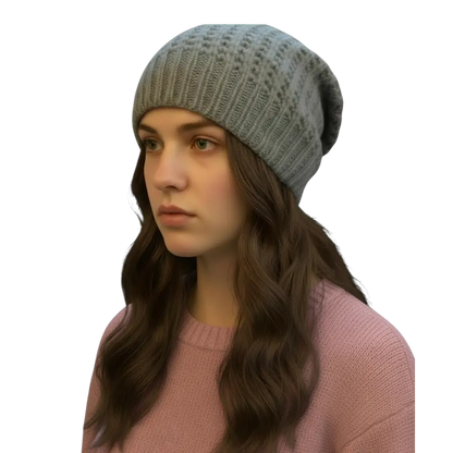 Gray knit hat with tie-back detail from Suzie Blue Canada, showcasing a cozy, simple style perfect for casual wear.