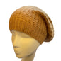 Simple knit hat with tie back by Suzie Blue Canada, featuring a cozy, stylish design perfect for casual wear.